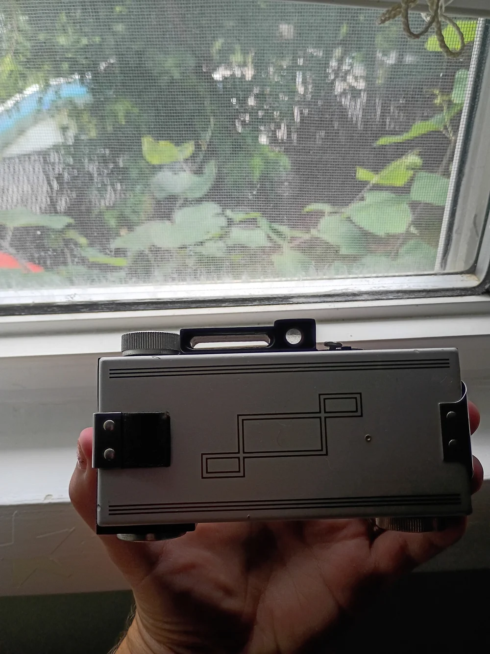 Vintage-Style Black Camera with Chrome Lens ARGUS